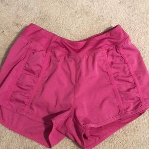 Pink running shorts